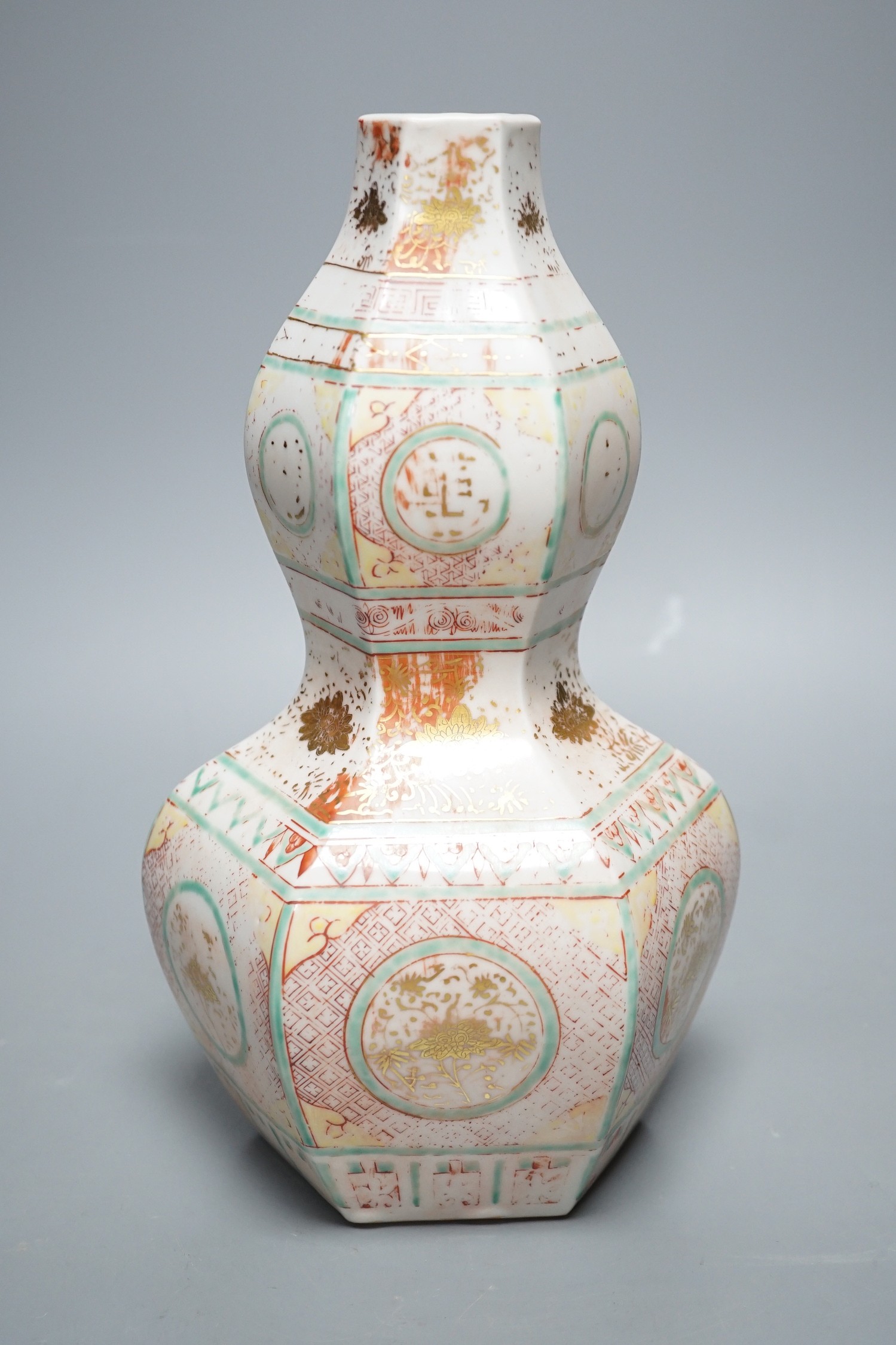 A Chinese famille rose gourd hexagonal shaped vase, Ming style, 28cm tall