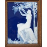 A framed figurative Limoges pate sur pate plaque of a classical maiden playing pans pipes, label