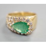 A modern yellow metal, pear cut emerald and diamond cluster set dress ring, size H, gross weight 5.1