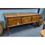 An 18th century elm and fruitwood low dresser, width 160cm, depth 41cm, height 82cm