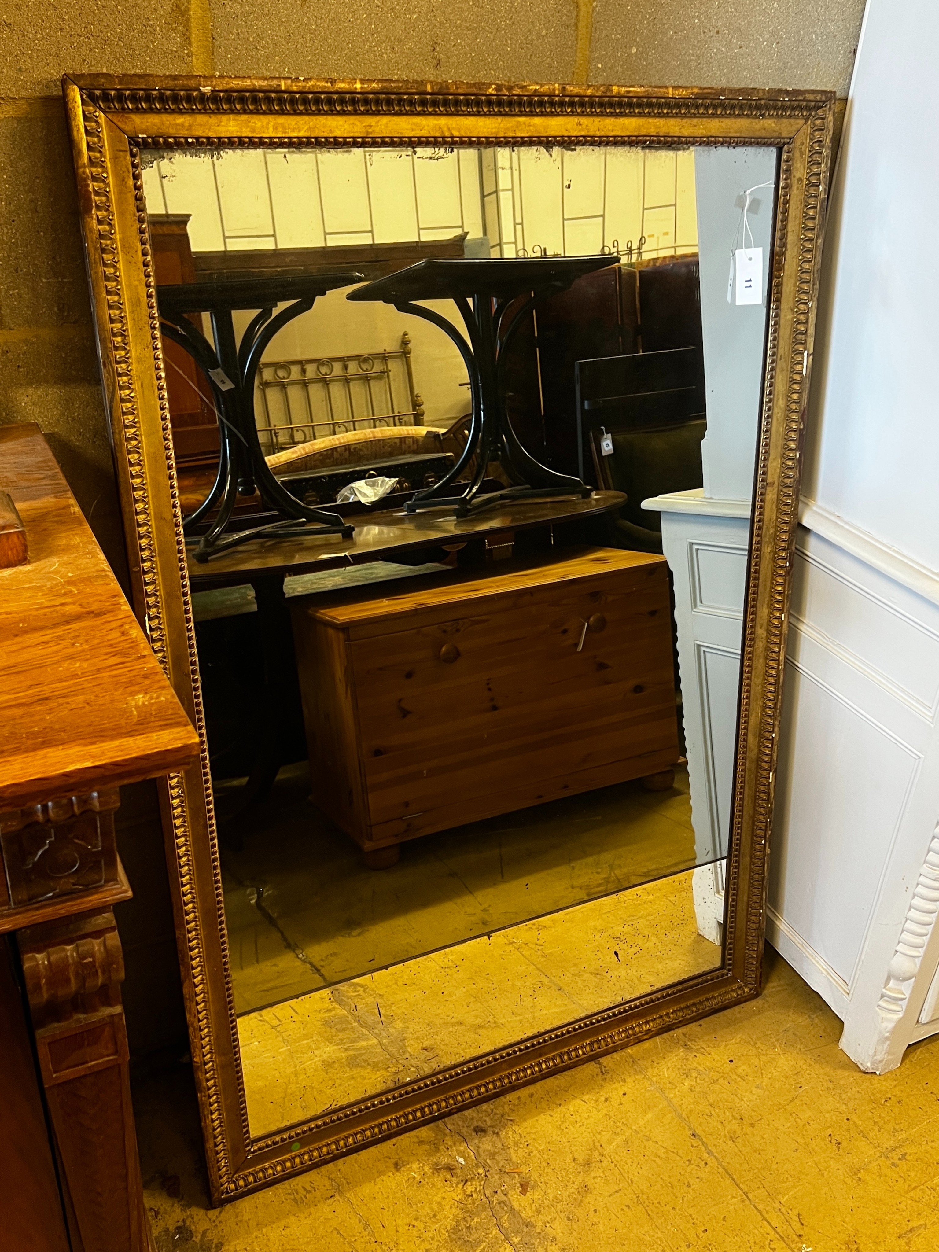 A 19th century rectangular giltwood and composition wall mirror, width 96cm, height 142cm