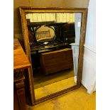 A 19th century rectangular giltwood and composition wall mirror, width 96cm, height 142cm