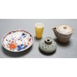 An 18th century Chinese Imari pattern saucer, a small Korean vase and two other pieces