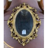 A 19th century Florentine carved giltwood mirror, width 36cm, height 48cm