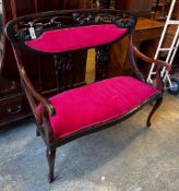 A late Victorian Art Nouveau mahogany upholstered salon settee, length 112cm, depth 50cm, height