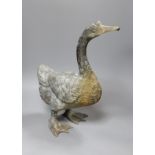 A weathered bronze garden fountain modelled as a goose, 46cm