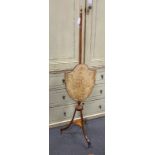 A Sheraton style mahogany pole screen, height 150cm