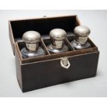 A mid 20th century Moynat Paris travelling triple scent bottle case, 18cm wide