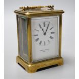 A brass carriage timepiece by Saqui & Lawrence of London, 11.5cm tall