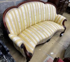 A Victorian upholstered carved mahogany settee, length 175cm, depth 90cm, height 90cm