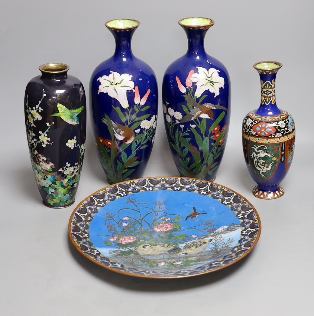 A group of Japanese cloisonné enamel wares to include a pair of vases, two other vases and a dish,