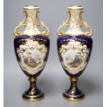 A pair of Coalport vases painted with Loch scenes by Percy Simpson, signed, 32cm