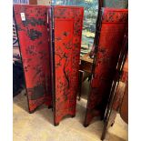 A pair of Chinese four fold lacquer screens decorated with exotic birds amongst branches, each panel
