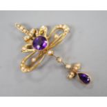 An Edwardian 15ct, amethyst and seed pearl set drop pendant brooch, overall 49mm, gross weight 5.3