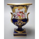 A Paris porcelain two-handled vase urn, with floral decoration, 16cm tall
