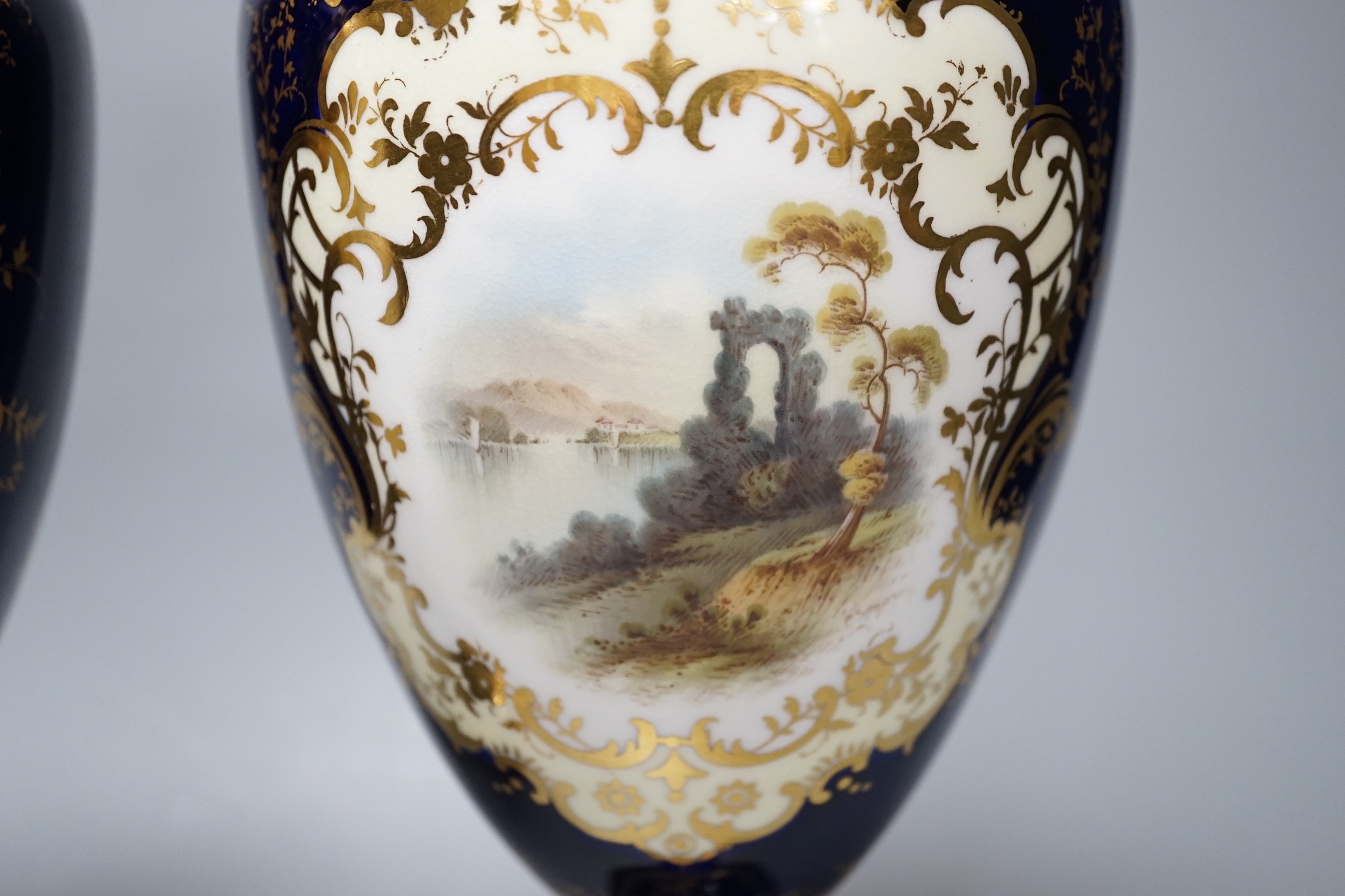 A pair of Coalport vases painted with Loch scenes by Percy Simpson, signed, 32cm - Bild 3 aus 7