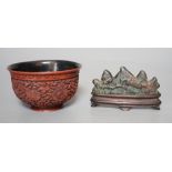 A Chinese painted metal brush rest on stand and a red lacquered bowl, 11cm