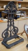 A Victorian cast iron umbrella stand, lacking tray to base,72.5 cms high,