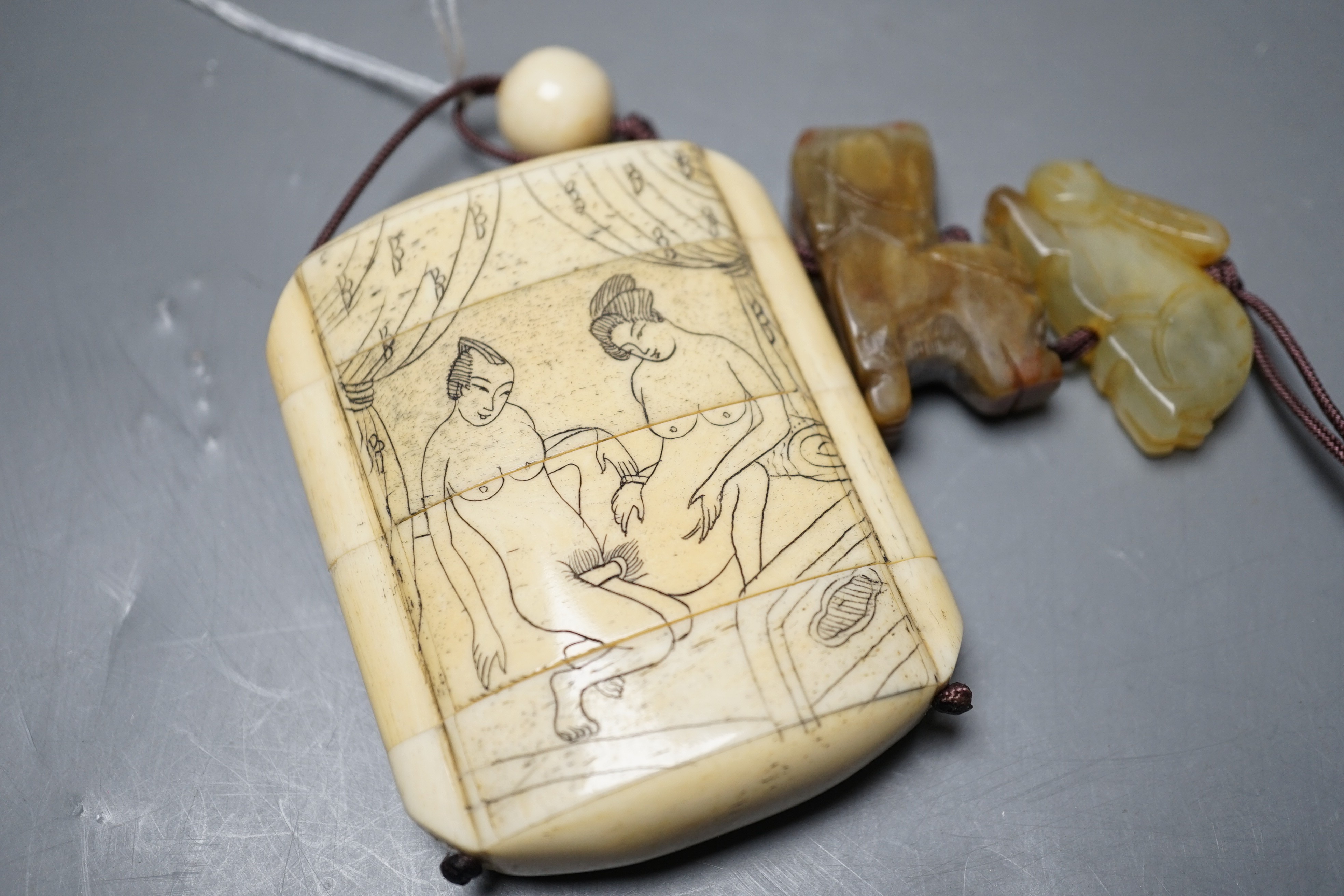 A bone inro with a marine engraving and inscription to one side, and an erotic scene to the reverse, - Image 3 of 8