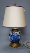 A late 19th century Chinese blue and white crackle glaze jar, now mounted as a lamp, total height