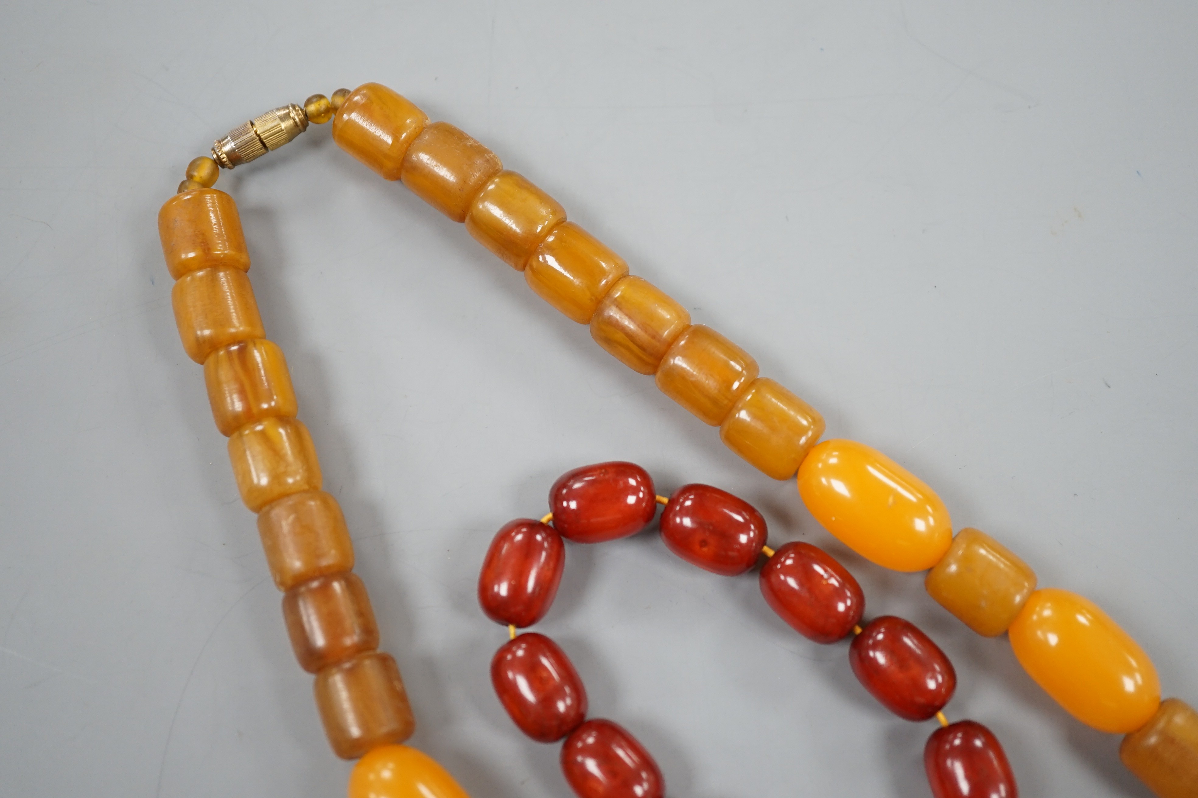 An amberoid expanding bracelet, and an amberoid necklace, 46cm. - Image 2 of 3