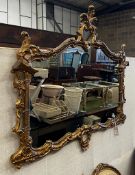 A Chinese Chippendale style giltwood framed and composition rectangular wall mirror, width 116cm,