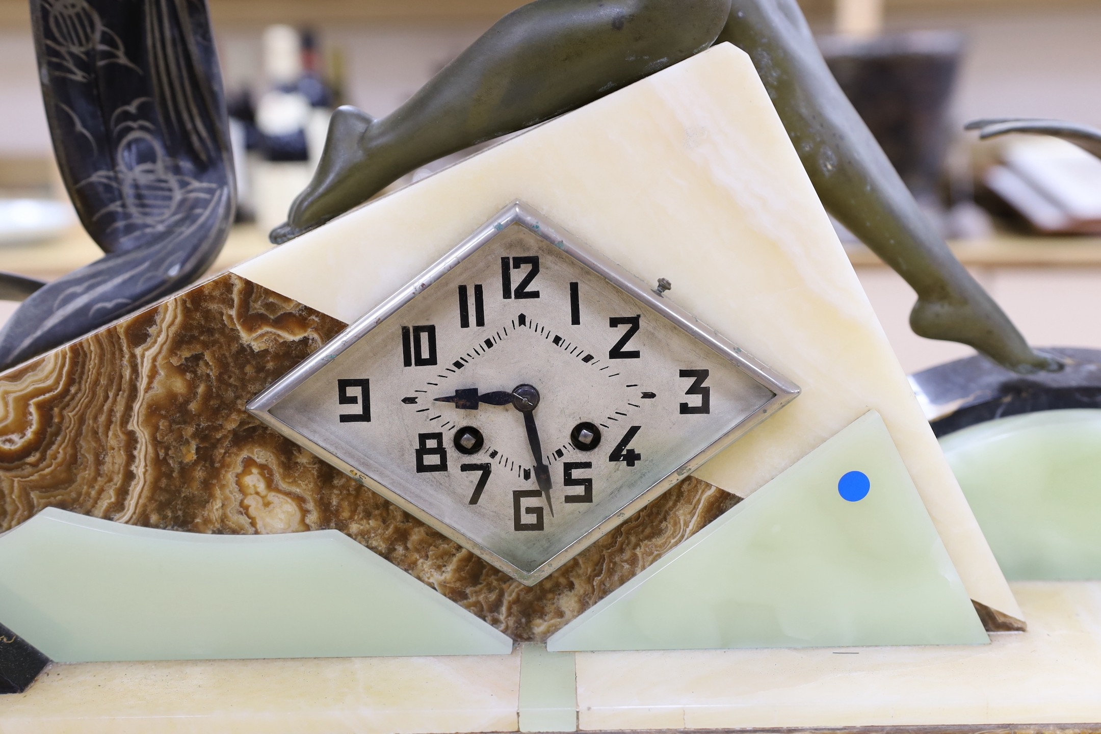 A large Art Deco spelter and marble clock garniture with a figural seaside mount, 59cm tall - Image 5 of 6