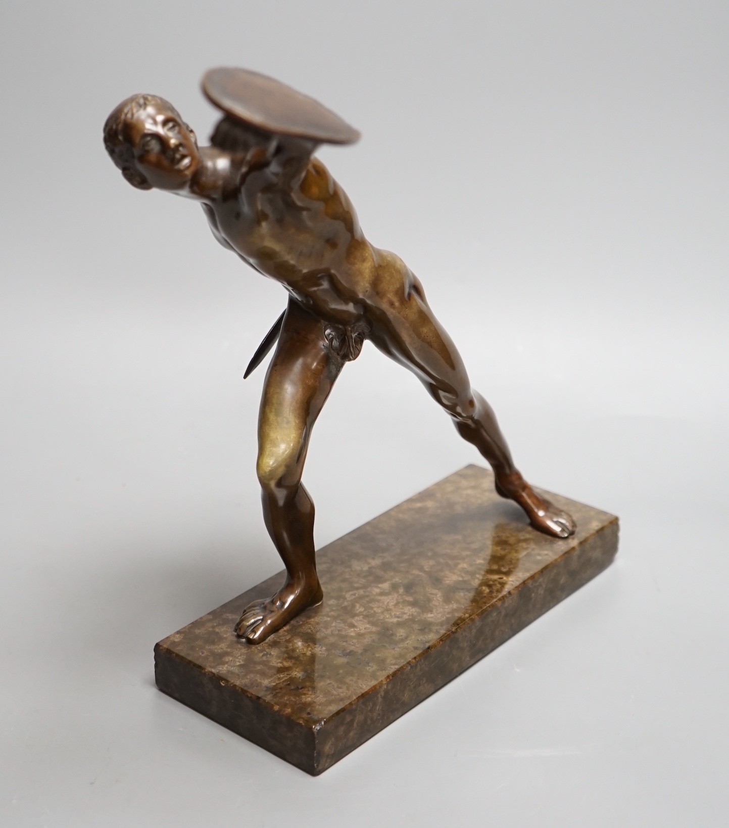 After the Antique, an early 20th century bronze study of the Borghese Gladiator, on marble base,