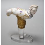 A late 18th / early 19th century Meissen ‘Frauen Kopf’ porcelain cane handle on plinth base,