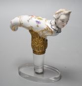A late 18th / early 19th century Meissen ‘Frauen Kopf’ porcelain cane handle on plinth base,
