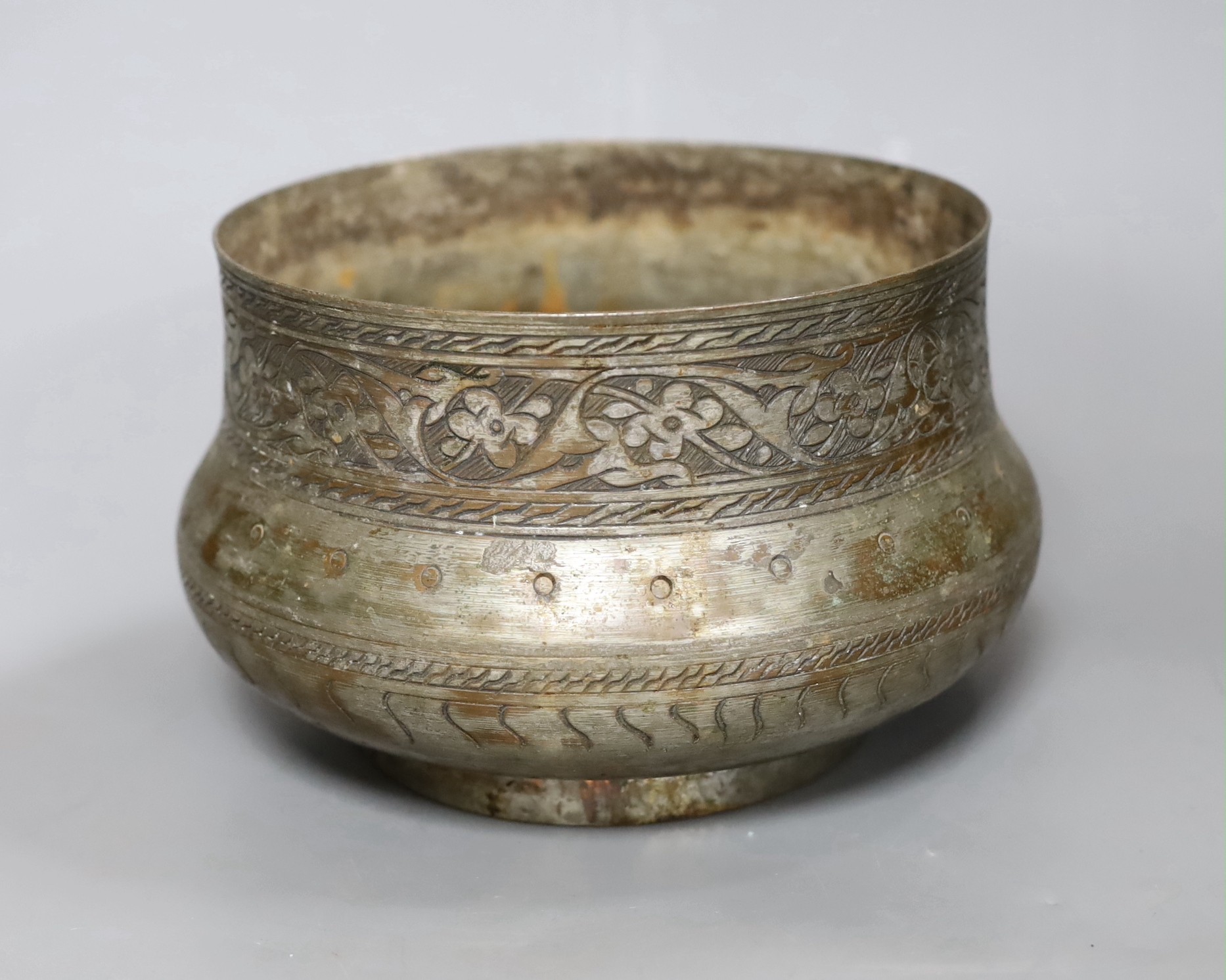 An Islamic tinned copper bowl, circa 1900, Tughra mark to base. 19cm