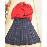 Two vintage Burberry items of clothing: a pleated skirt and a red Harrington jacket,