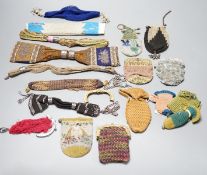 Seven 19th century cut steel misers purses, five beaded and knitted metal framed purses, two