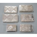 Five similar 20th century Spanish engraved white metal rectangular pill boxes, of varying sizes,