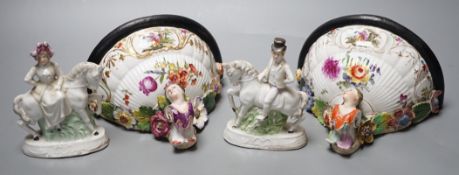 A pair of Dresden porcelain wall brackets and a pair of porcelain horses and riders, 12cm tall