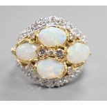 A modern 18ct white gold, diamond and four stone oval white opal set cluster dress ring, size N,