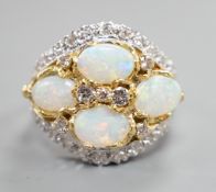 A modern 18ct white gold, diamond and four stone oval white opal set cluster dress ring, size N,