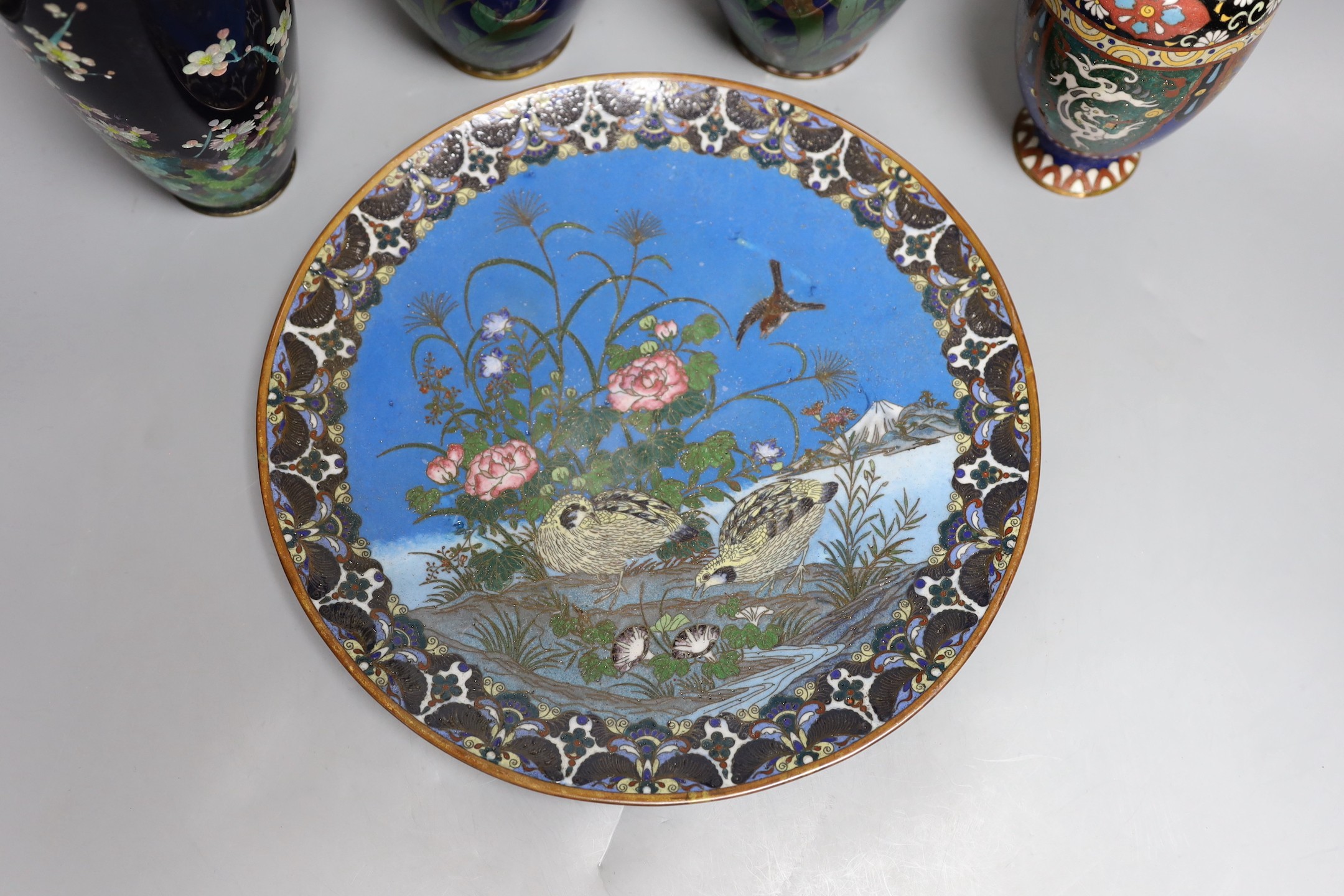 A group of Japanese cloisonné enamel wares to include a pair of vases, two other vases and a dish, - Image 2 of 7