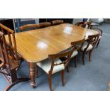 An early Victorian mahogany rectangular extending dining table, length 220cm extended, three spare