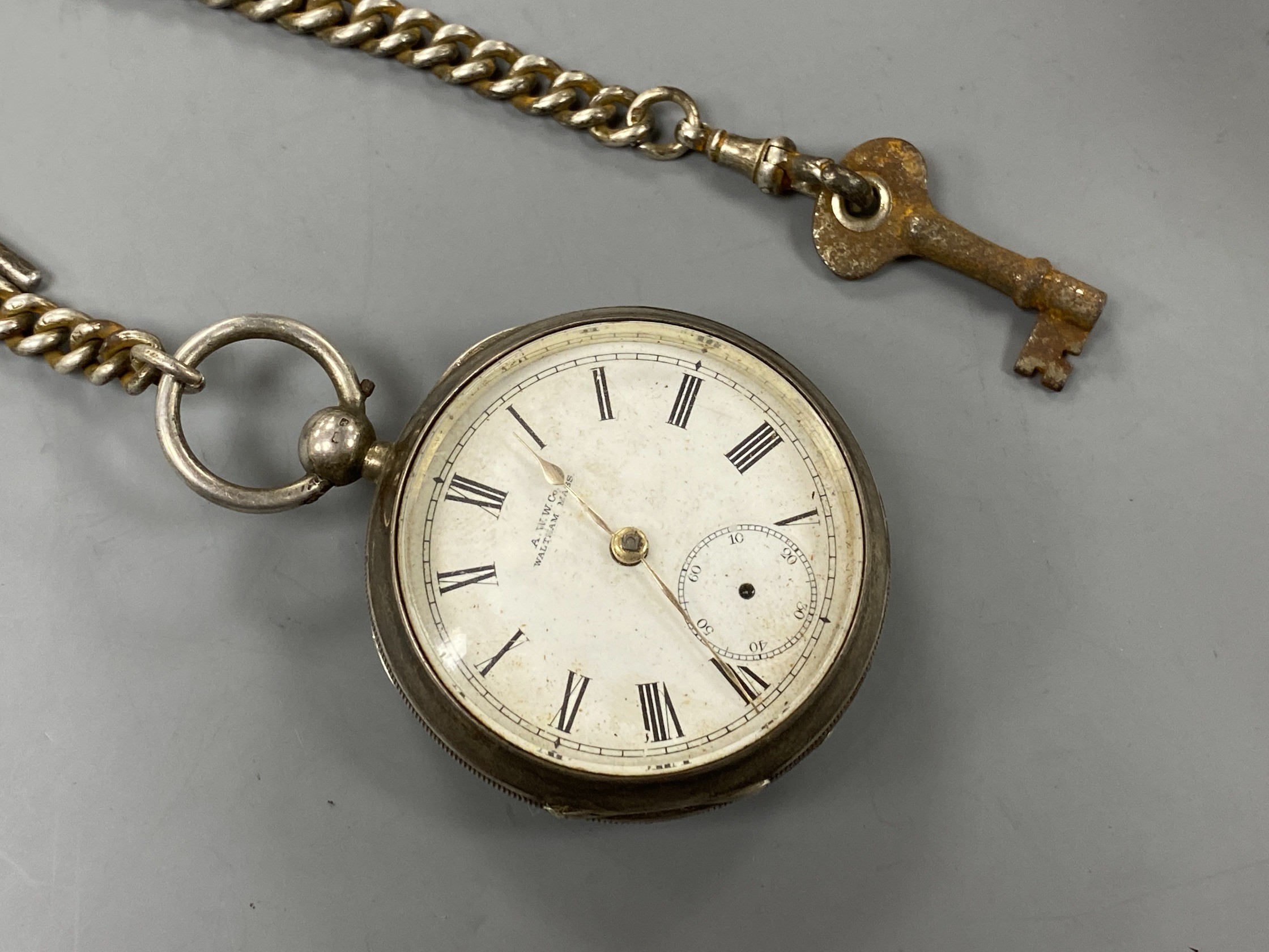 A late Victorian Waltham silver open faced key wind pocket watch, on a silver albert. - Bild 2 aus 3