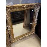 A Victorian rectangular giltwood and composition wall mirror, converted from a picture frame,