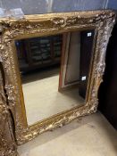 A Victorian rectangular giltwood and composition wall mirror, converted from a picture frame,