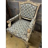 A French painted elbow chair with tapestry upholstery, width 64cm, depth 70cm, height 94cm