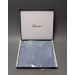 A blue and purple silk Chopard scarf in original box with certificate