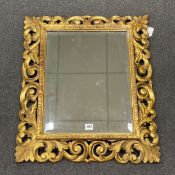 A 19th century French carved giltwood wall mirror, width 58cm, height 68cm