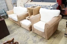 A rattan conservatory suite comprising two seater settee, length 180cm, depth 85cm, height 184cm,
