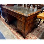 An early 20th century George III style mahogany pedestal desk, length 152cm, depth 91cm, height