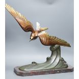 A large Art Deco bronze figure of a seabird, mounted on a marble base, signed Brault, 55.5 cms