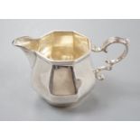 A George V silver panelled cream jug, Charles Stuart Harris & Sons, London, 1916, 82mm, 6.5oz.