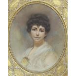 LS 1892, oil on canvas, Portrait of a lady, monogrammed and dated, framed to the oval, 60 x 50cm